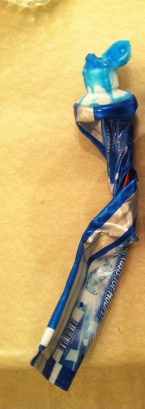 Toothpaste tube which is wrecked